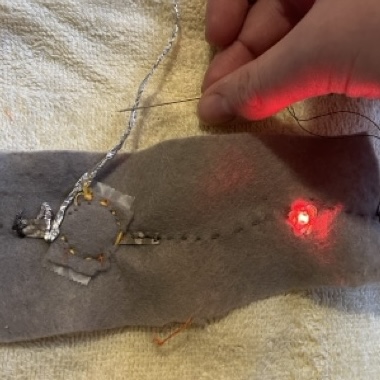 Big shock. The tinfoil was conductive.