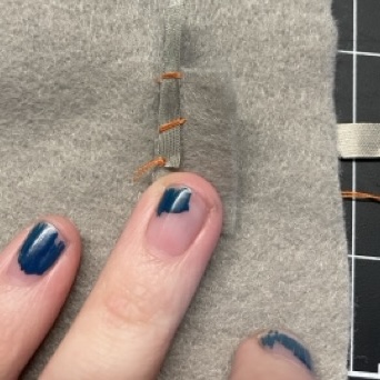 I tried using conductive fabric for the third try at a battery pouch.