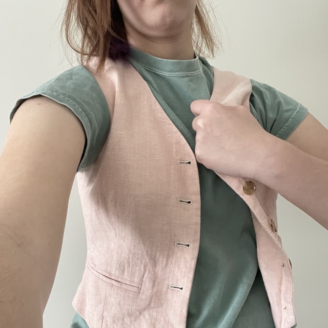 interaction of putting on a vest