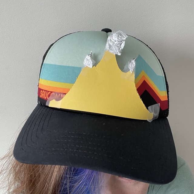 a hat that is pretending to be a tiara interaction