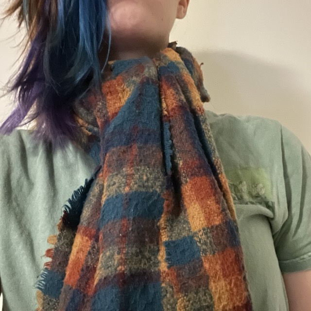 a picture of wearingf a scarf as a wearable interaction 