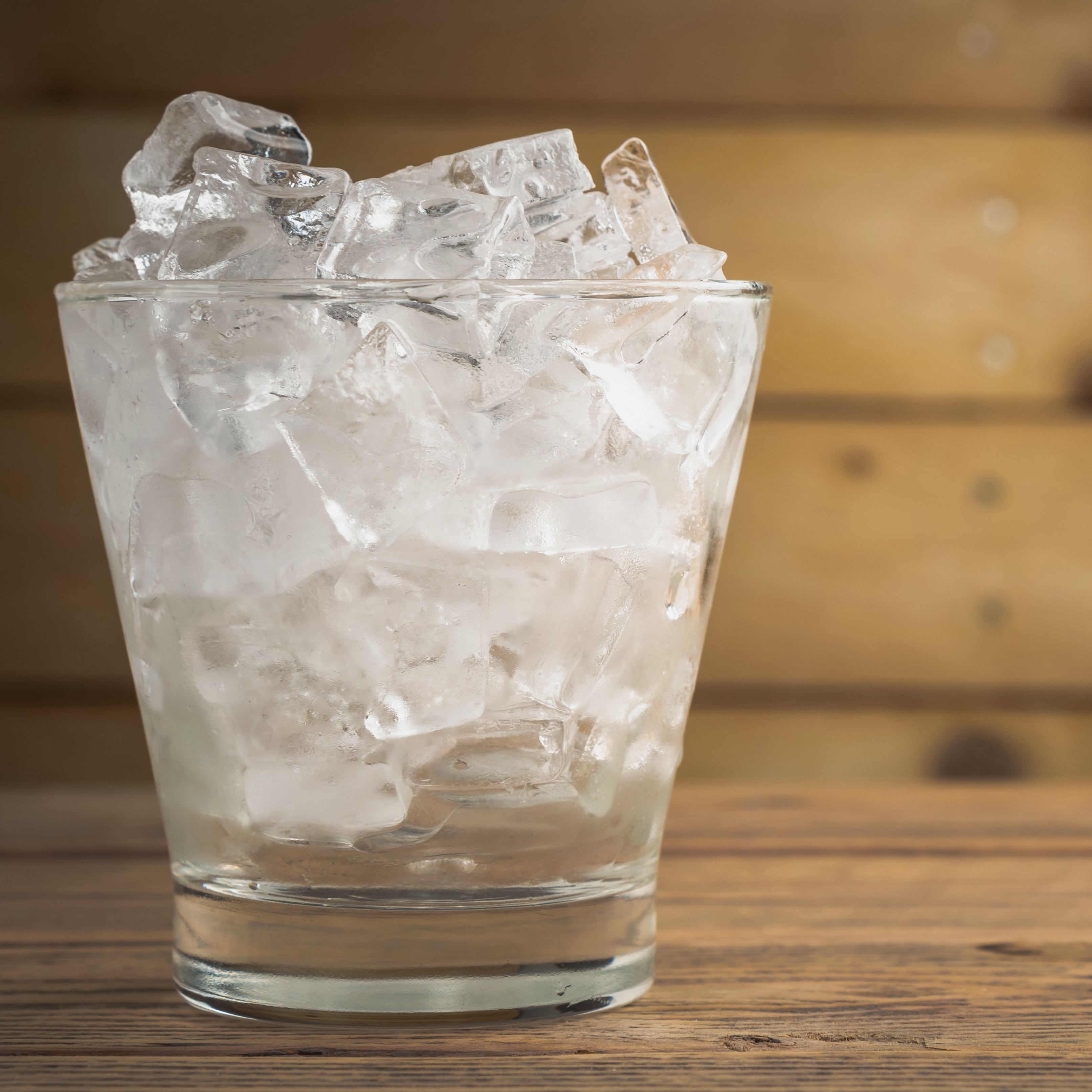 pouring ice into a metal glass and then shaking it. I thought the sound it made was kinda fun, image from: amornchaijj. (2026). One glass of ice on wood table. In Adobe stock. https://stock.adobe.com/ca/images/one-glass-of-ice-on-wood-table/140147412?prev_url=detail .