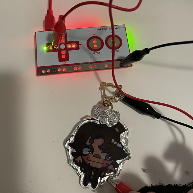 This image is me exploring the idea of using a character as the interactable interface, and showing one of the ways that could work. This keychain is by Mio Machi.