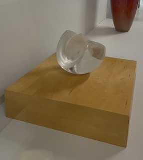 A glass creation set up on front of the glass blowing studio created by the students within